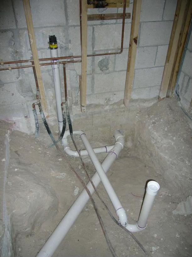Can I backfill wall cavities with concrete?